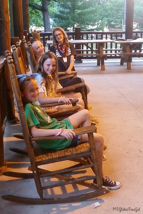 Michigan gluten free camp on porch in rocking chairs