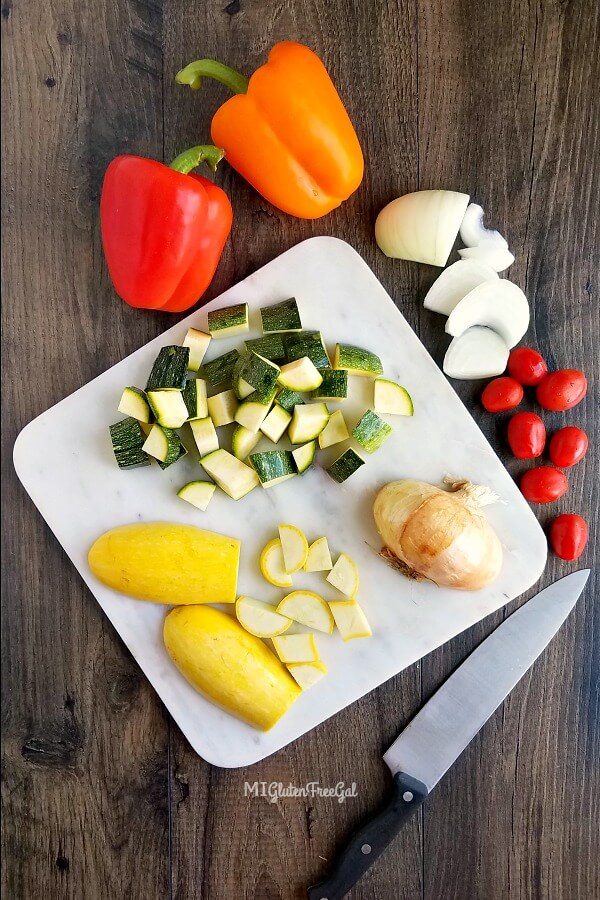 pasta salad reshoot vegetables on cutting board