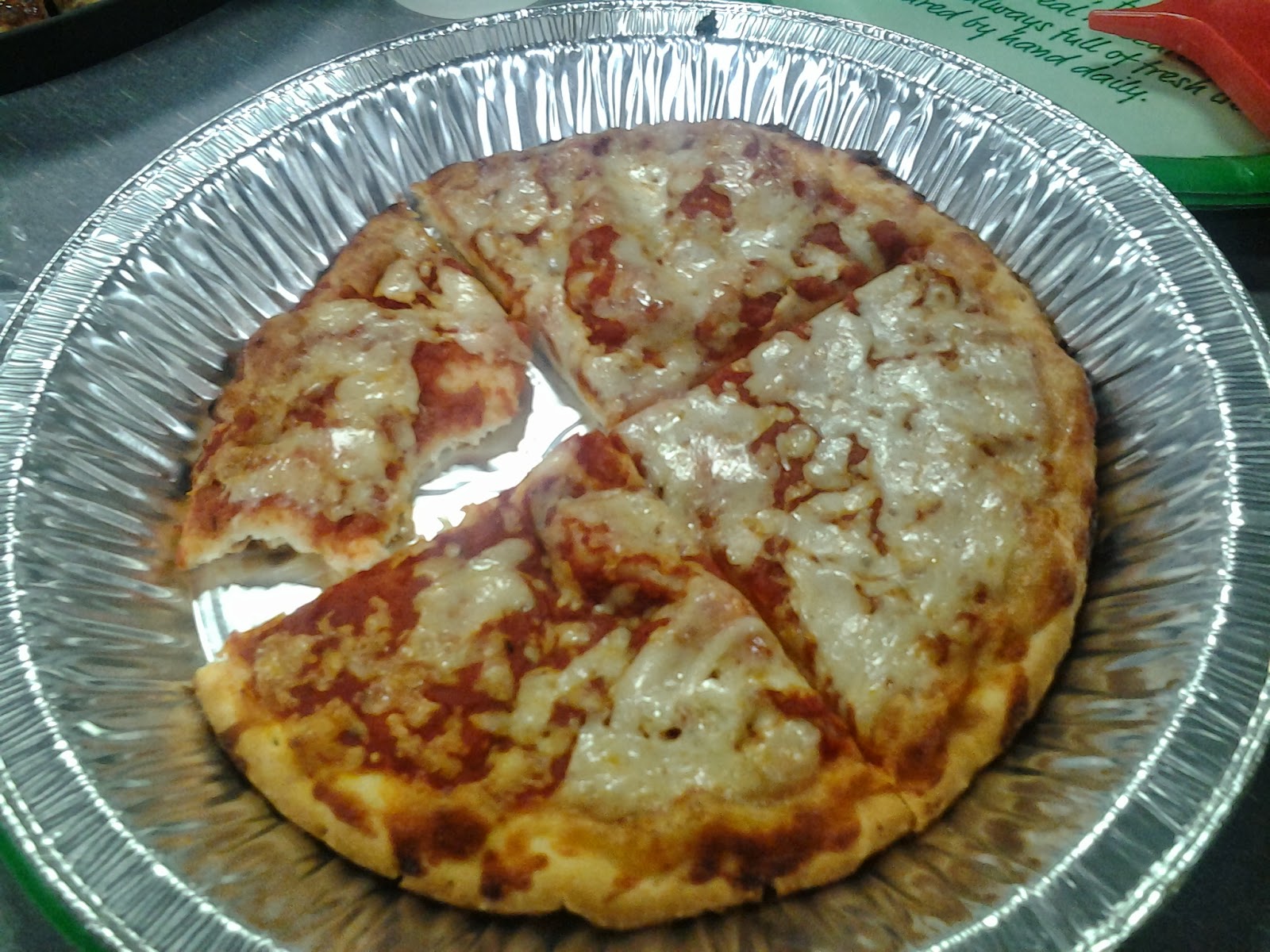 Chuck E Cheese Gluten Free Pizza in pan - MI Gluten Free Gal