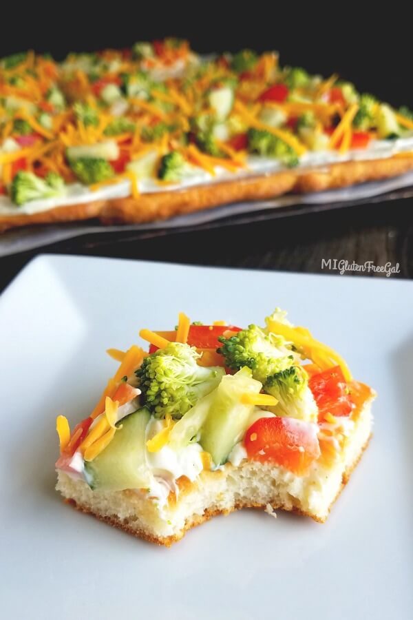 cold veggie pizza piece on plate