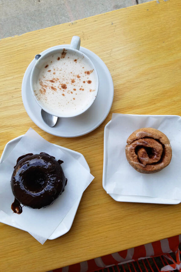 Chai Latte, gluten free chocolate donut and gluten free cinnamon roll