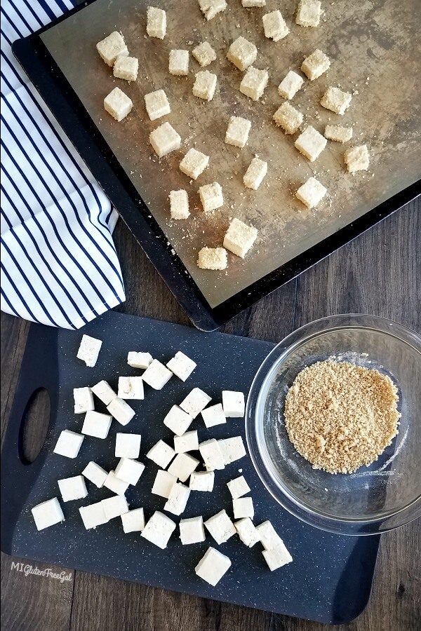 coated tofu on baking sheet