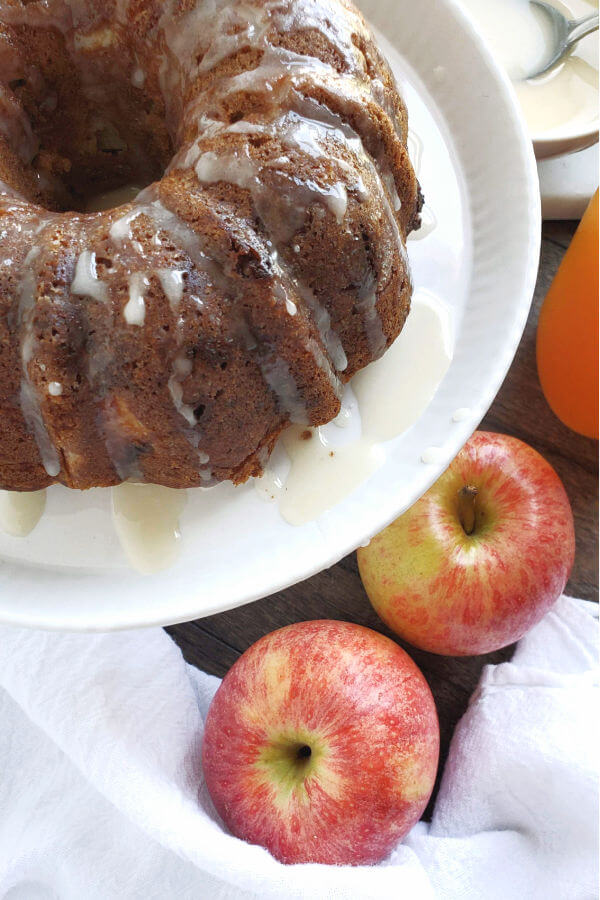 small gluten free applesauce bundt cake glazed close up