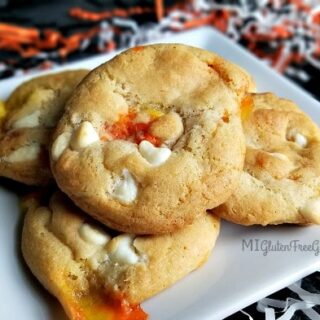 Gluten Free White Chocolate Candy Corn Cookies on plate with confetti