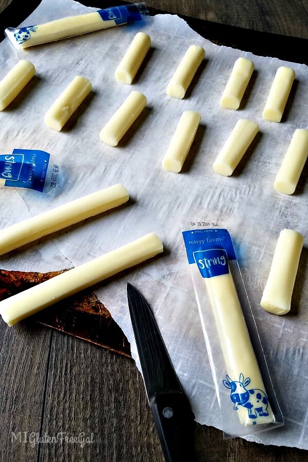 These baked mozzarella cheese sticks start with simple string cheese