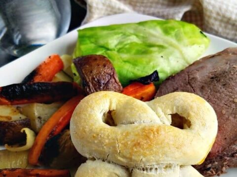 Chebe Grain Free Three Leaf Clover Rolls plated with beef, vegetables and cabbage