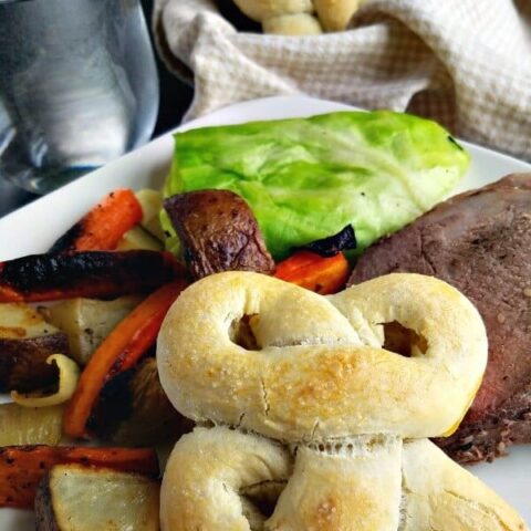 Chebe Grain Free Three Leaf Clover Rolls plated with beef, vegetables and cabbage