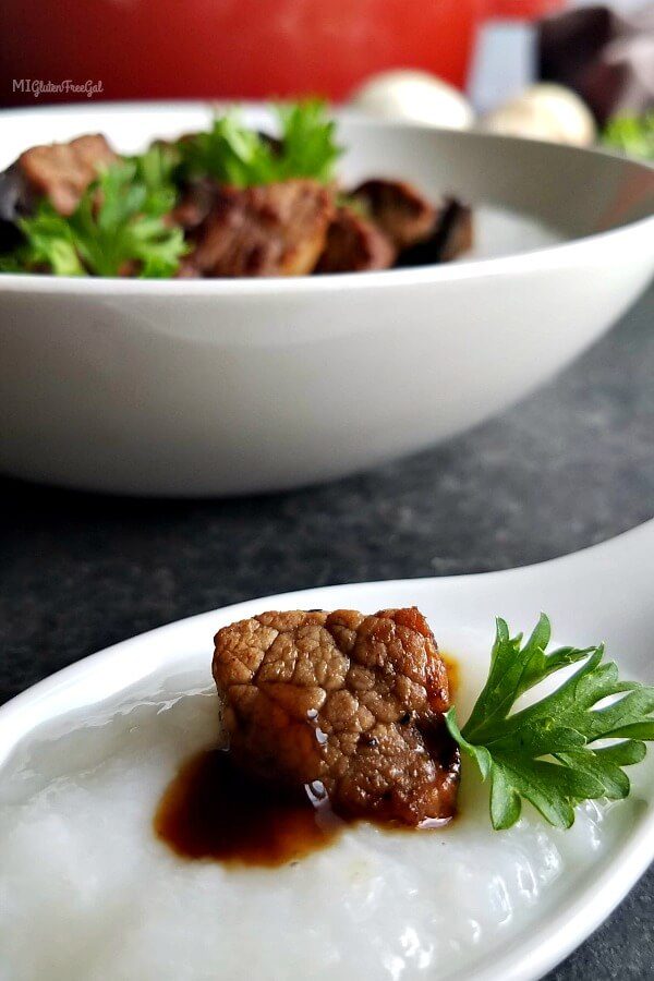 Delta Blues Rice Congee Beef on Spoon with Parsley