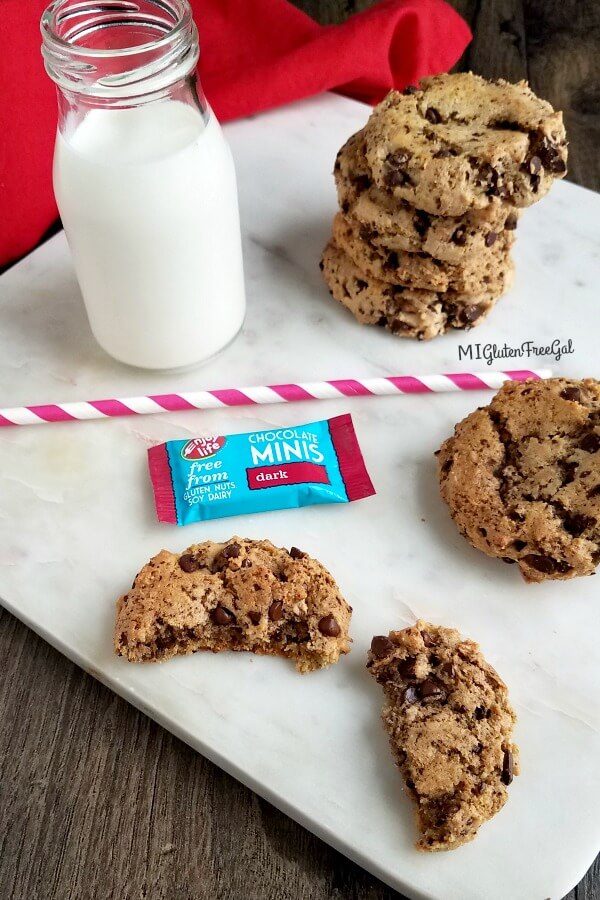 gluten free tahini chocolate chip cookies (vegan) cookie halved on white marble