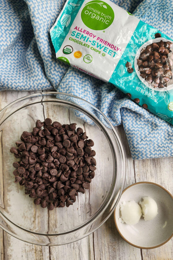 Melt chocolate chips and coconut oil together for the perfect topping for Gluten Free Choco Tacos 