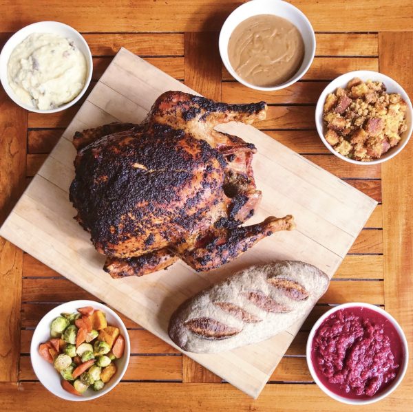 Zingerman's Roadhouse in Ann Arbor, Michigan offers a Thanksgiving to to menu that includes turkey, potatoes and vegetables. Unfortunately no gluten free stuffing, bread or pies. 